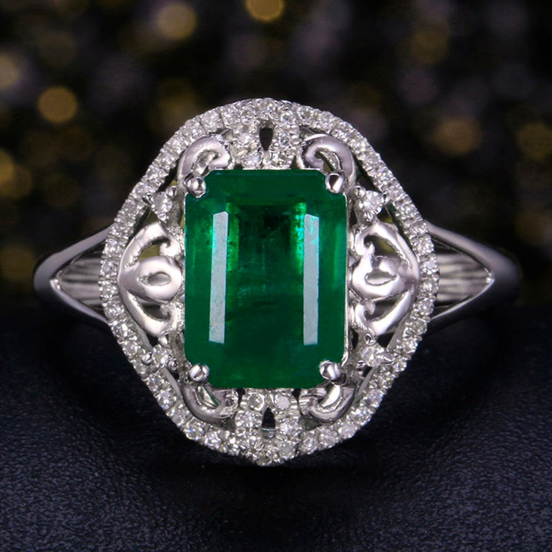 14k Gold 2.47 Ctw Vivid Green Natural Emerald & Diamond Ring: Ref:231032106 // gold content:14k gold // ring size:7. 25us // // main gemstone:emerald // shape:octagonal // carat weight:2. 29ct // color:vivid green // treatment:natural // // adjacent gemstone 2