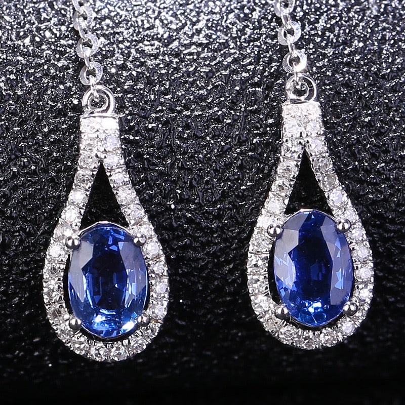14k Gold 1.01 Ct Natural Sapphire & Diamond Earrings: Ref:231032107 // gold content:14k gold // main gemstone:sapphire // shape:oval // carat weight:1. 01ct // color:blue // treatment:natural // // adjacent gemstone 2 : diamond // shape:round // clarity