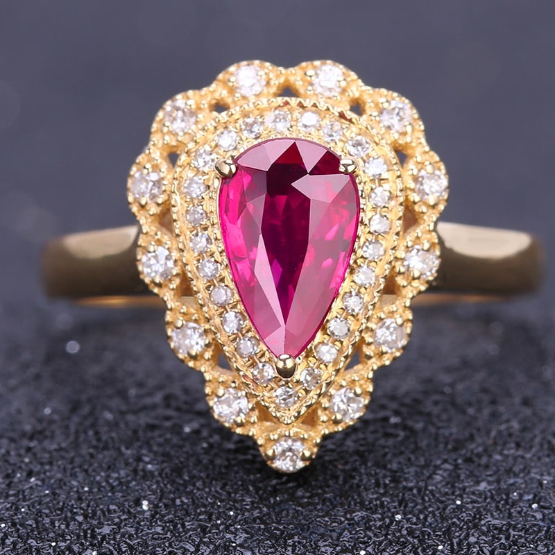 14k Gold 1.05 Ct Natural Ruby & Diamond Ring: Ref:231032114 // gold content:14k gold // ring size:7. 25us // // main gemstone:ruby // shape:pear // carat weight:1. 05ct // color:red // treatment:natural // // adjacent gemstone 2 : diamond //