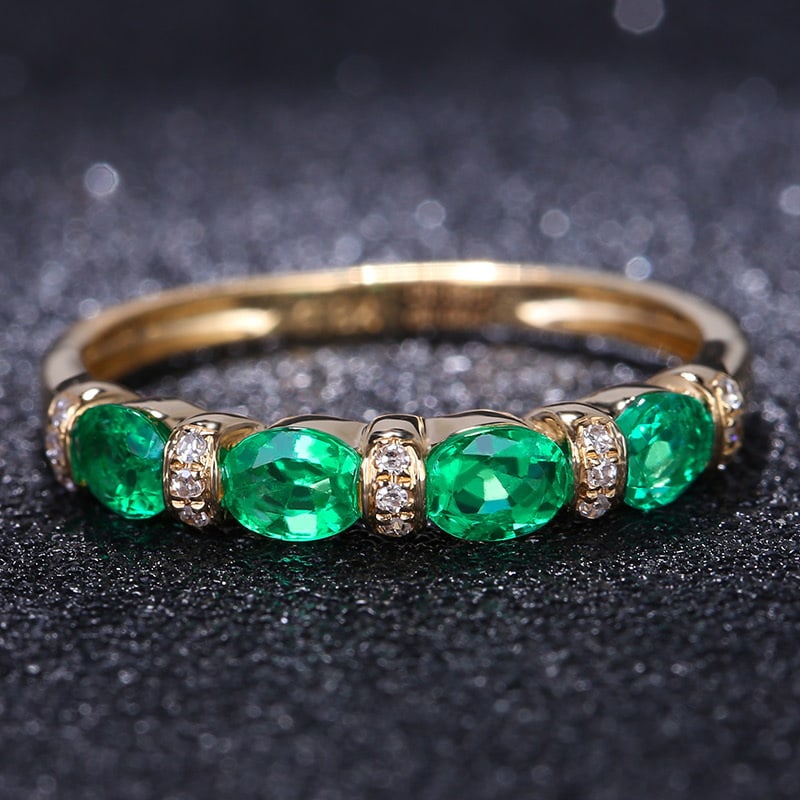 14k Gold 0.68 Ct Vivid Green Natural Emerald & Diamond Ring: Ref:231032121 // gold content:14k gold // ring size:7. 25us // // main gemstone:emerald // shape:oval // carat weight:0. 68ct // color:vivid green // treatment:natural // // adjacent gemstone 2 :