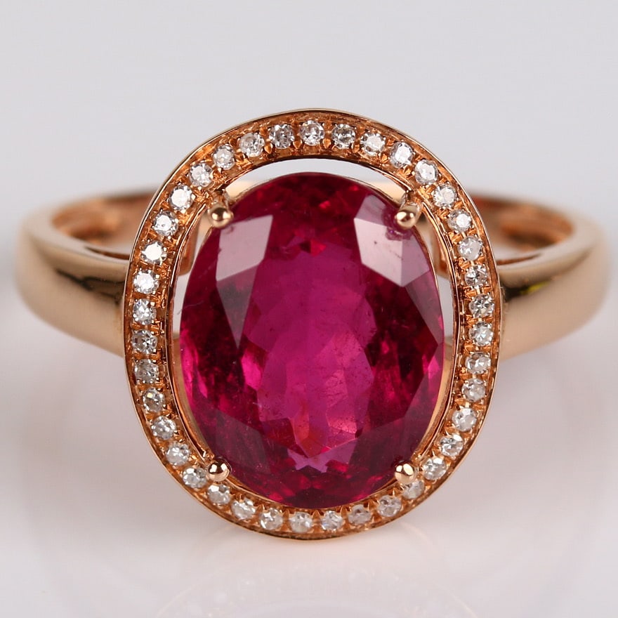 14k Gold 3.3 Ct Natural Tourmaline & Diamond Ring: Ref:231032130 // gold content:14k gold // ring size:7. 25us // // main gemstone:tourmaline // shape:oval // carat weight:3. 3ct // color:red // treatment:natural // // adjacent gemstone 2 : diamond