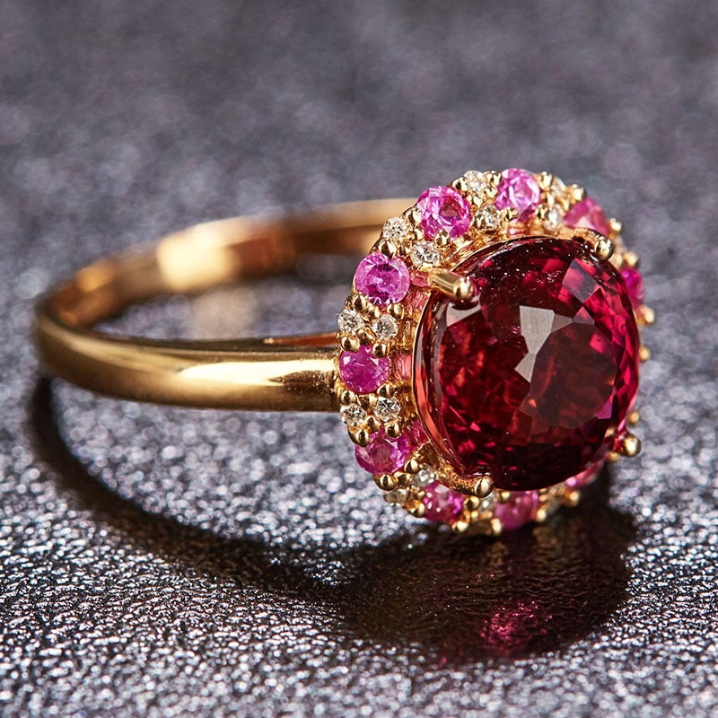 14k Gold 2.85 Ct Natural Tourmaline & Diamond & Sapphire Ring: Ref:231032136 // gold content:14k gold // ring size:7. 25us // // main gemstone:tourmaline // shape:oval // carat weight:2. 85ct // color:red // treatment:natural // // adjacent gemstone 2 : diamond