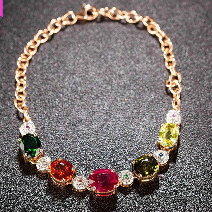 14k Gold 7 Ct Natural Tourmaline & Spessartine & Chrysoberyl & Diamond Bracelet: Ref:231032137 // gold content:14k gold // main gemstone:tourmaline & spessartine & chrysoberyl // shape:oval // carat weight:7ct // color:color // treatment:natural // // adjacent gemstone 2 : diamond