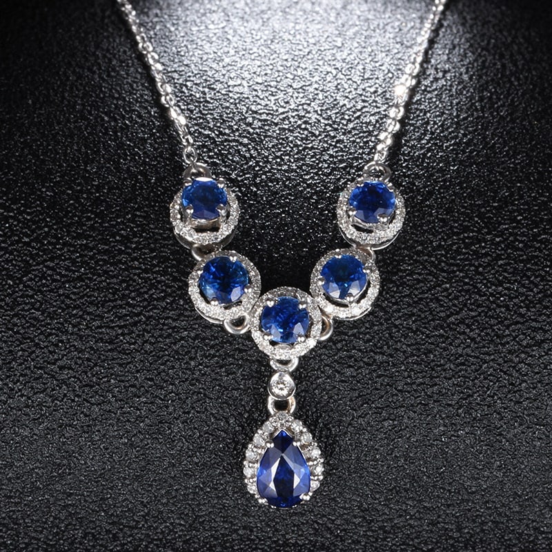 14k Gold 1.95 Ct Natural Sapphire & Diamond Necklace: Ref:231032169 // gold content:14k gold // main gemstone:sapphire // shape:multiply // carat weight:1. 95ct // color:blue // treatment:natural // // adjacent gemstone 2 : diamond // shape:round //