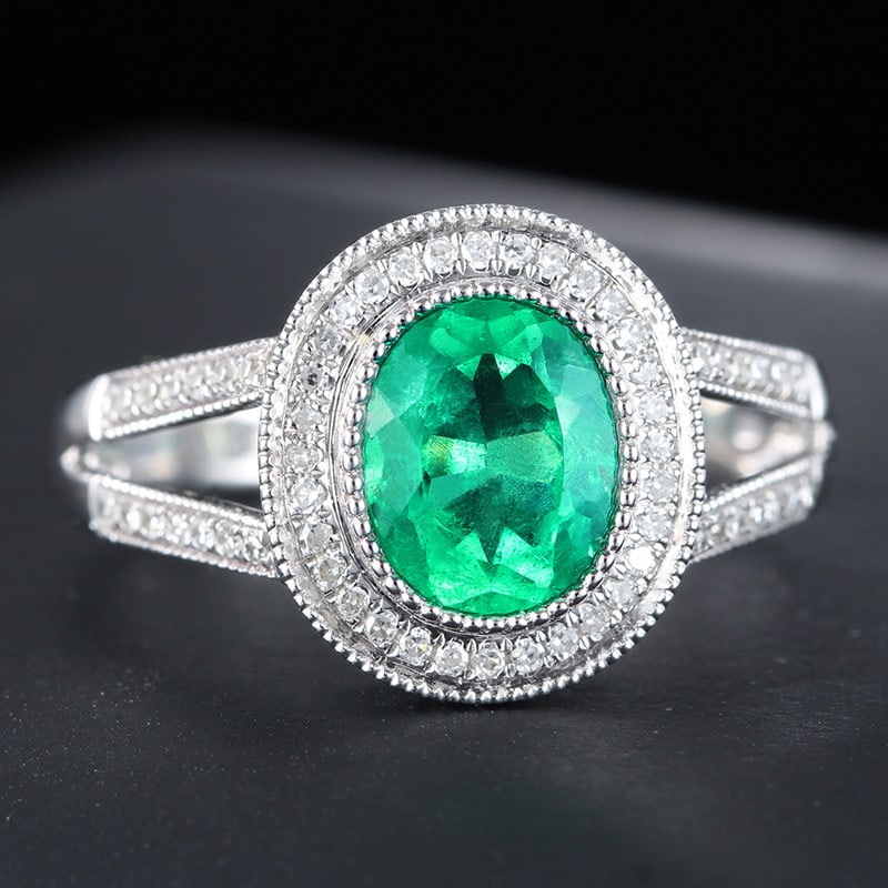 14k Gold 1.1 Ct Natural Emerald & Diamond Ring: Ref:231032172 // gold content:14k gold // ring size:7. 25us // // main gemstone:emerald // shape:oval // carat weight:1. 1ct // color:green // treatment:natural // // adjacent gemstone 2 : diamond // 