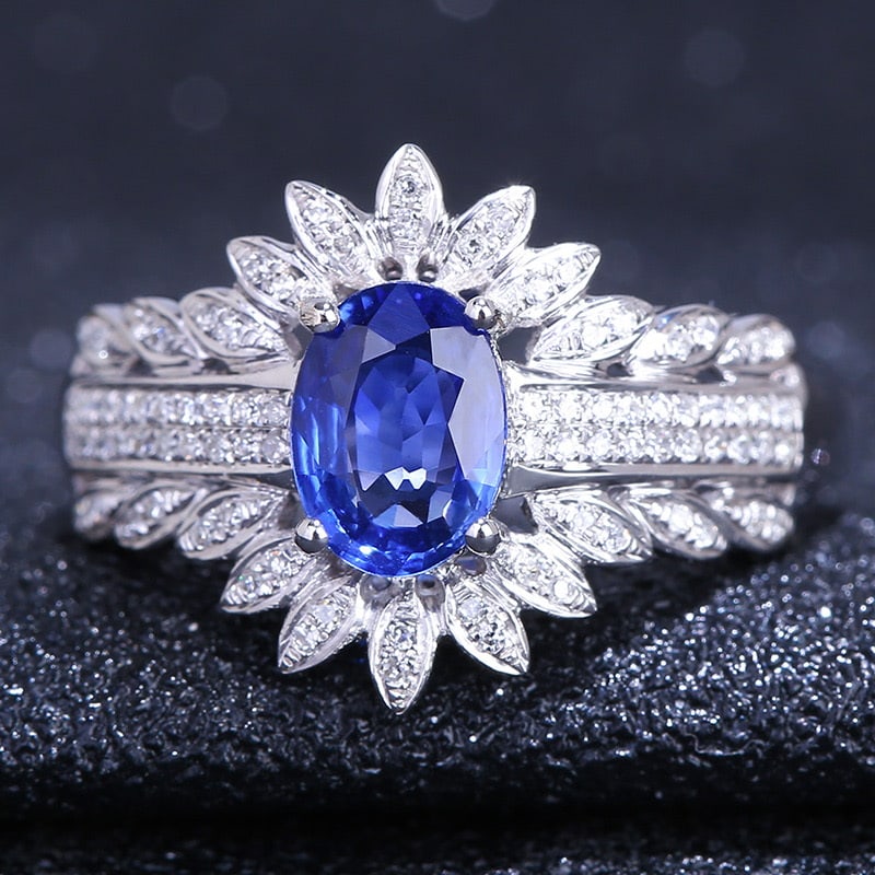 14k Gold 0.9 Ct Natural Sapphire & Diamond Ring: Ref:231032183 // gold content:14k gold // ring size:7. 25us // // main gemstone:sapphire // shape:oval // carat weight:0. 9ct // color:blue // treatment:natural // // adjacent gemstone 2 : diamond //
