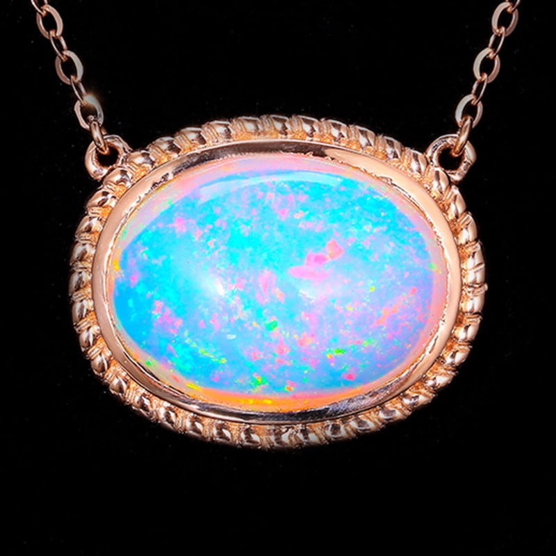 14k Gold 4.39 Ct Natural Opal Necklace: Ref:231032197 // gold content:14k gold // main gemstone:opal // shape:oval // carat weight:4. 39ct // color:color // treatment:natural // Condition: New Low Estimate: 2200.00 High Estimate: 3300.00