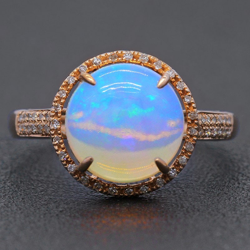 14k Gold 2.30 Ctw Natural Opal & Diamond Ring: Ref:231032198 // gold content:14k gold // ring size:7. 25us // // main gemstone:opal // shape:round // carat weight:2. 15ct // color:color // treatment:natural // cut grade:g // // adjacent gemstone 2