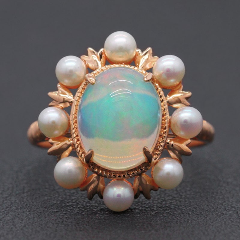 14k Gold 2.18 Ct Natural Opal & Pearl Ring: Ref:231032199 // gold content:14k gold // ring size:7. 25us // // main gemstone:opal // shape:oval // carat weight:2. 18ct // color:color // treatment:natural // // adjacent gemstone 2 : pearl //