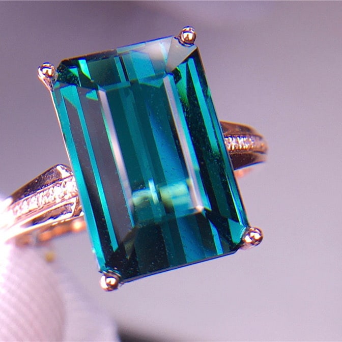 14k Gold 7 Ct Natural Tourmaline & Diamond Ring: Ref:231032201 // gold content:14k gold // ring size:7. 25us // // main gemstone:tourmaline // shape:octagonal // carat weight:7ct // color:green // treatment:natural // // adjacent gemstone 2 :