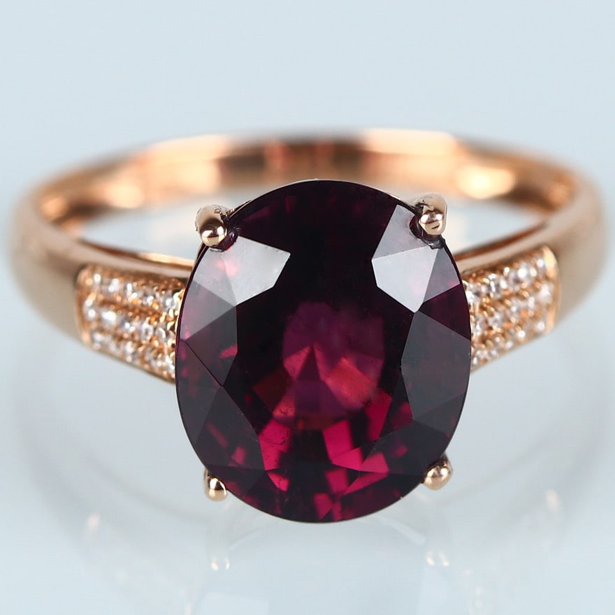 14k Gold 4.15 Ct Natural Tourmaline & Diamond Ring: Ref:231032202 // gold content:14k gold // ring size:7. 25us // // main gemstone:tourmaline // shape:oval // carat weight:4. 15ct // color:red // treatment:natural // // adjacent gemstone 2 : diamond