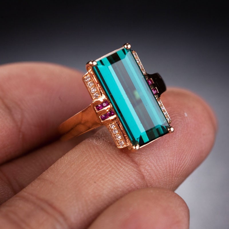 14k Gold 4.55 Ct Natural Tourmaline & Diamond & Ruby Ring: Ref:231032204 // gold content:14k gold // ring size:7. 25us // // main gemstone:tourmaline // shape:octagonal // carat weight:4. 55ct // color:green // treatment:natural // // adjacent gemstone 2 :