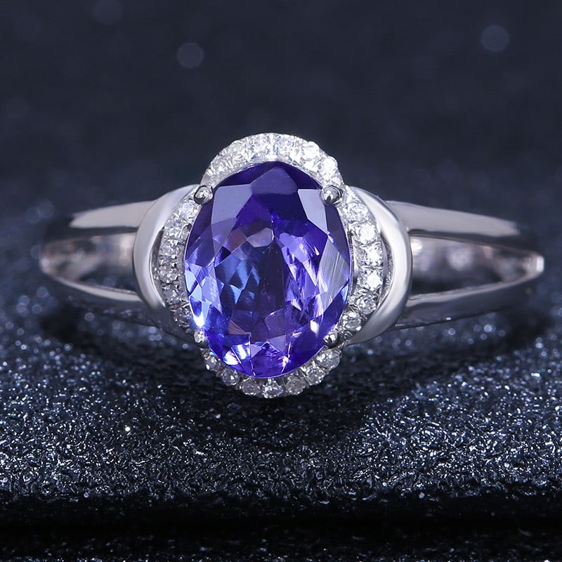 14k Gold 1.6 Ct Natural Tanzanite & Diamond Ring: Ref:231032205 // gold content:14k gold // ring size:7. 25us // // main gemstone:tanzanite // shape:oval // carat weight:1. 6ct // color:blue // treatment:natural // // adjacent gemstone 2 : diamond