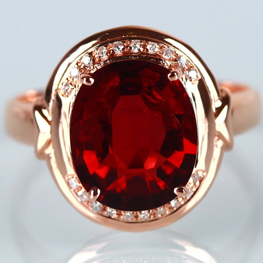 14k Gold 2.9 Ct Natural Tourmaline & Diamond Ring: Ref:231032210 // gold content:14k gold // ring size:7. 25us // // main gemstone:tourmaline // shape:oval // carat weight:2. 9ct // color:red // treatment:natural // // adjacent gemstone 2 : diamond
