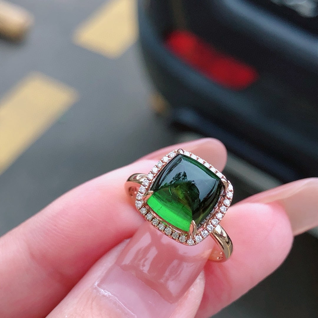 14k Gold 4.81 Ct Natural Tourmaline & Diamond Ring: Ref:231032239 // gold content:14k gold // ring size:7. 25us // // main gemstone:tourmaline // shape:suger-loaf // carat weight:4. 81ct // color:green // treatment:natural // // adjacent gemstone 2 :