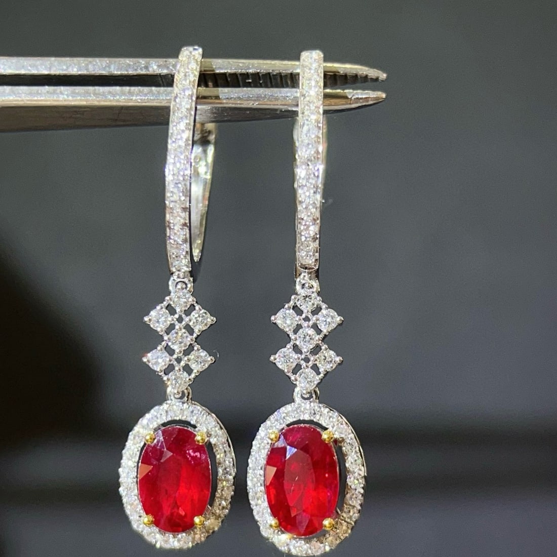 14k Gold 1.4 Ctw Natural Ruby & Diamond Earrings: Ref:231032250 // gold content:14k gold // main gemstone:ruby // shape:oval // carat weight:1. 1ct // color:pigeonblood red // treatment:natural // // adjacent gemstone 2 : diamond // shape:round //