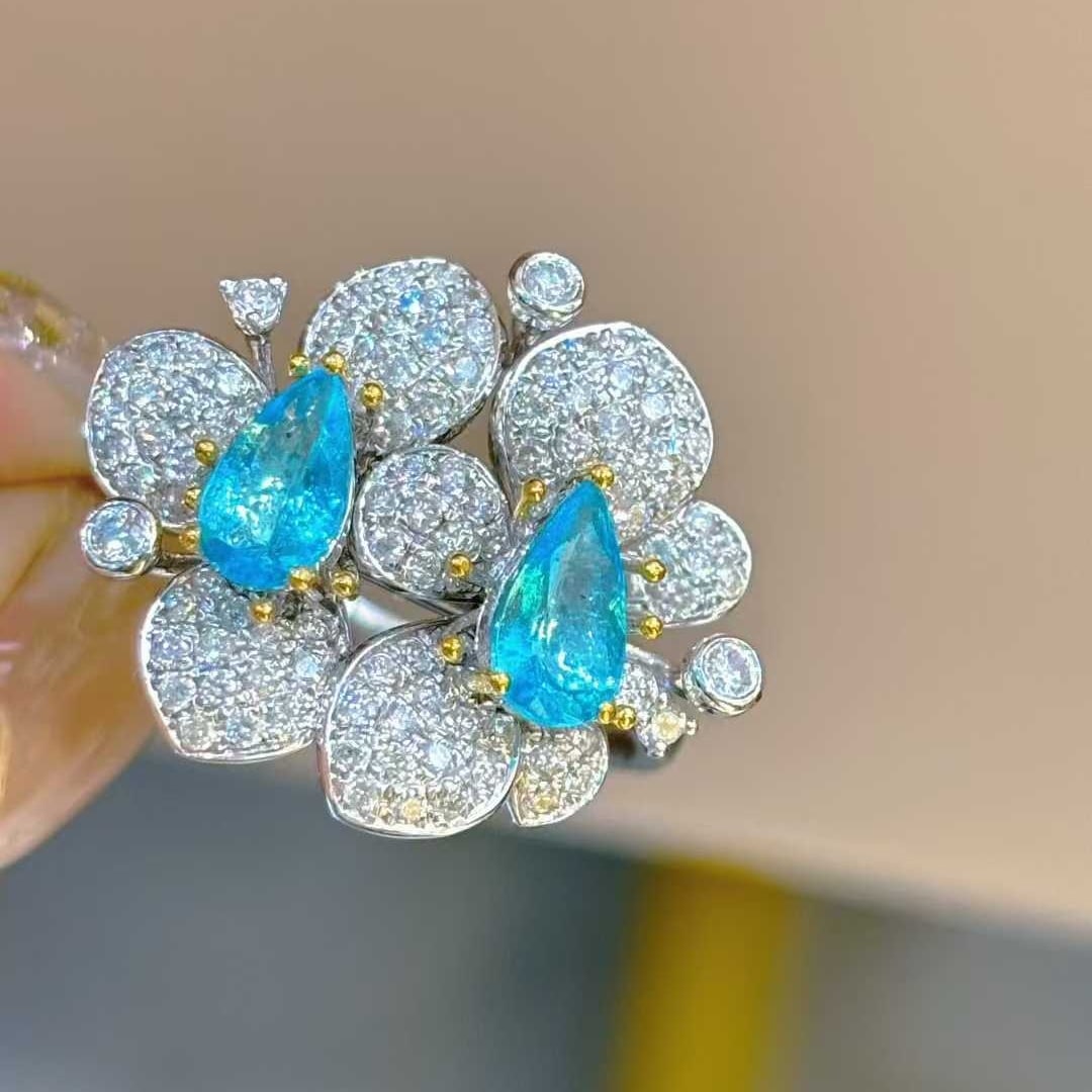 14k Gold 0.78 Ct Natural Paraiba Tourmaline & Diamond Ring: Ref:231032274 // gold content:14k gold // ring size:7. 25us // // main gemstone:paraiba tourmaline // shape:pear // carat weight:0. 78ct // color:blue // treatment:natural // // adjacent gemstone 2 :
