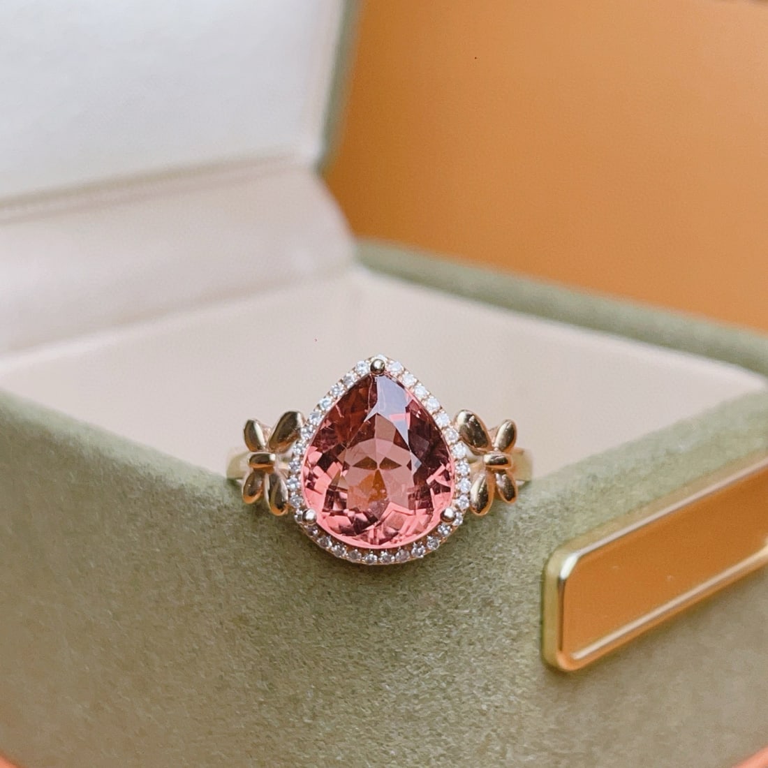 14k Gold 2.87 Ct Natural Tourmaline & Diamond Ring: Ref:231032275 // gold content:14k gold // ring size:7. 25us // // main gemstone:tourmaline // shape:pear // carat weight:2. 87ct // color:orangish pink // treatment:natural // // adjacent gemstone 2