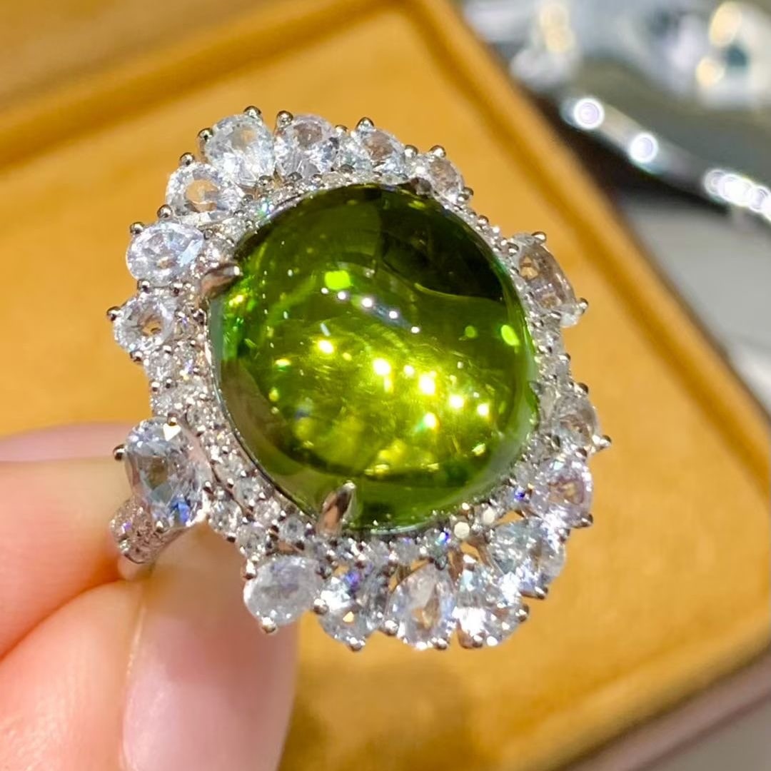 14k Gold 7.65 Ct Natural Tourmaline & Diamond & Sapphire Ring: Ref:231032311 // gold content:14k gold // ring size:7. 25us // // main gemstone:tourmaline // shape:oval // carat weight:7. 65ct // color:green // treatment:natural // // adjacent gemstone 2 : diamond