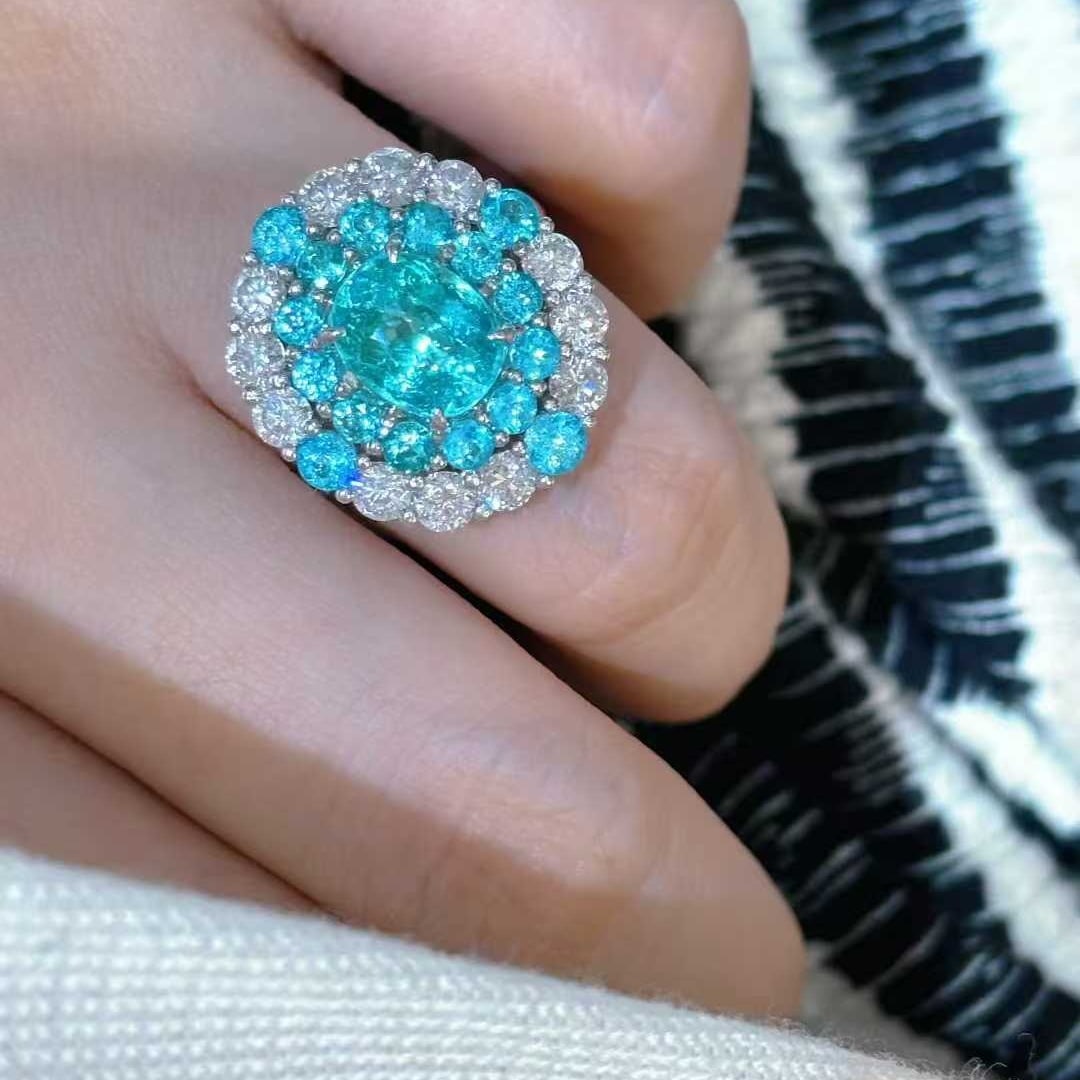 14k Gold 5.42 Ctw Natural Paraiba Tourmaline & Diamond Ring: Ref:231032314 // gold content:14k gold // ring size:7. 25us // // main gemstone:paraiba tourmaline // shape:multiply // carat weight:3. 82ct // color:blue // treatment:natural // // adjacent gemstone 
