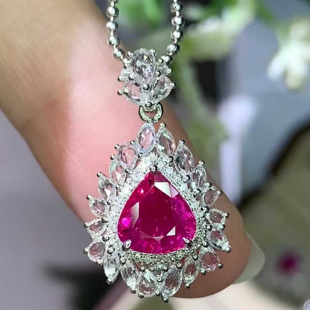 14k Gold 1.38 Ct Natural Ruby & Diamond & Sapphire Pendant( Without Chain ): Ref:231032342 // gold content:14k gold // main gemstone:ruby // shape:pear // carat weight:1. 38ct // color:red // treatment:natural // // adjacent gemstone 2 : diamond // shape:round // clarity