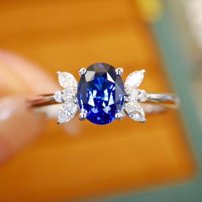14k Gold 0.82 Ctw Natural Sapphire & Diamond Ring: Ref:231032348 // gold content:14k gold // ring size:7. 25us // // main gemstone:sapphire // shape:oval // carat weight:0. 70ct // color:royal blue // treatment:natural // // adjacent gemstone 2 :