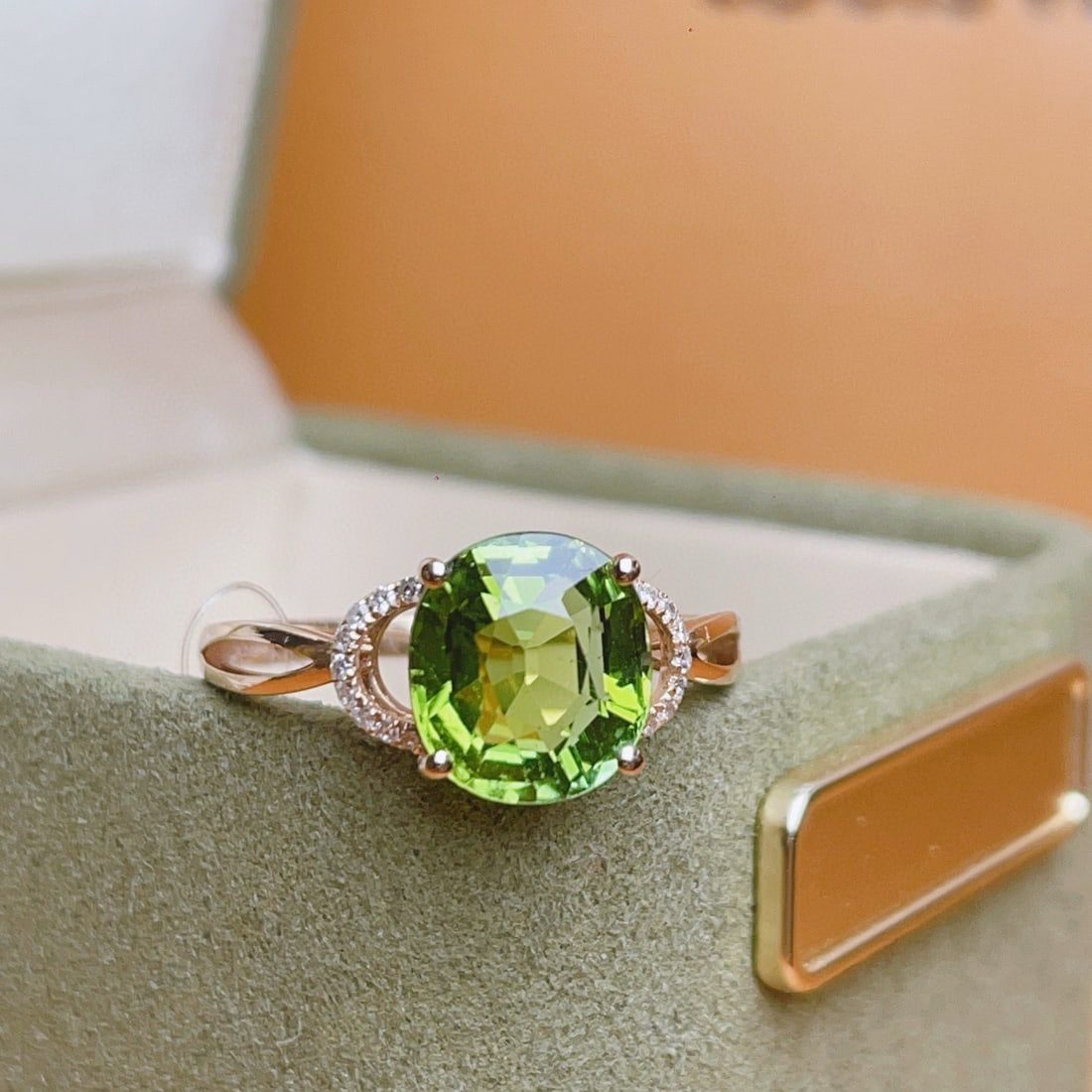 14k Gold 2.4 Ct Natural Tourmaline & Diamond Ring: Ref:231032358 // gold content:14k gold // ring size:7. 25us // // main gemstone:tourmaline // shape:oval // carat weight:2. 4ct // color:green // treatment:natural // // adjacent gemstone 2 : diamond