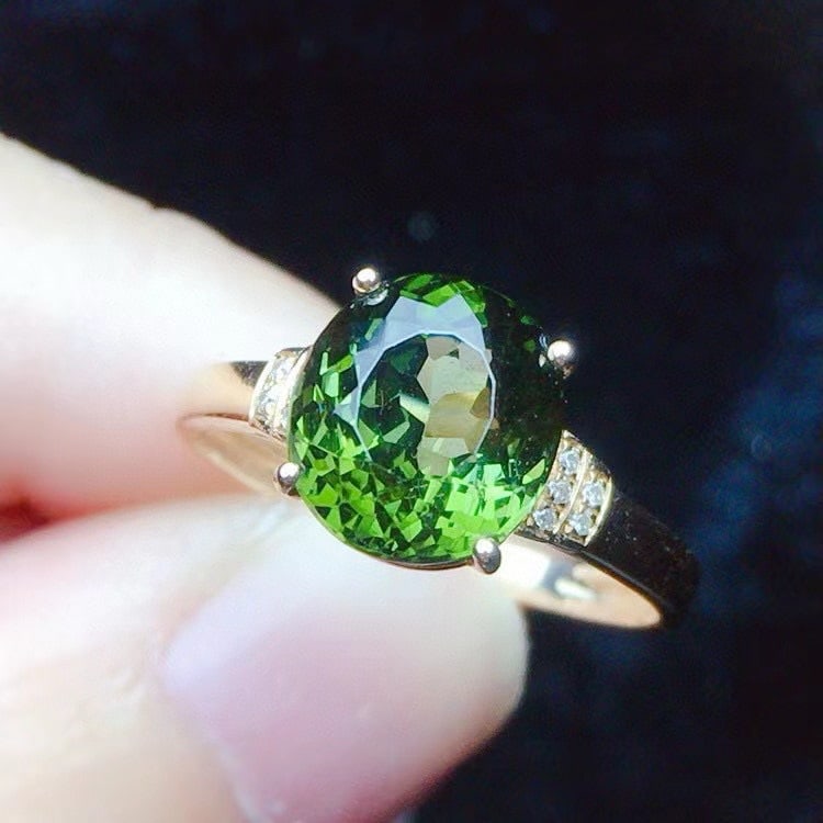 14k Gold 3.5 Ct Natural Tourmaline & Diamond Ring: Ref:231032360 // gold content:14k gold // ring size:7. 25us // // main gemstone:tourmaline // shape:oval // carat weight:3. 5ct // color:green // treatment:natural // // adjacent gemstone 2 : diamond