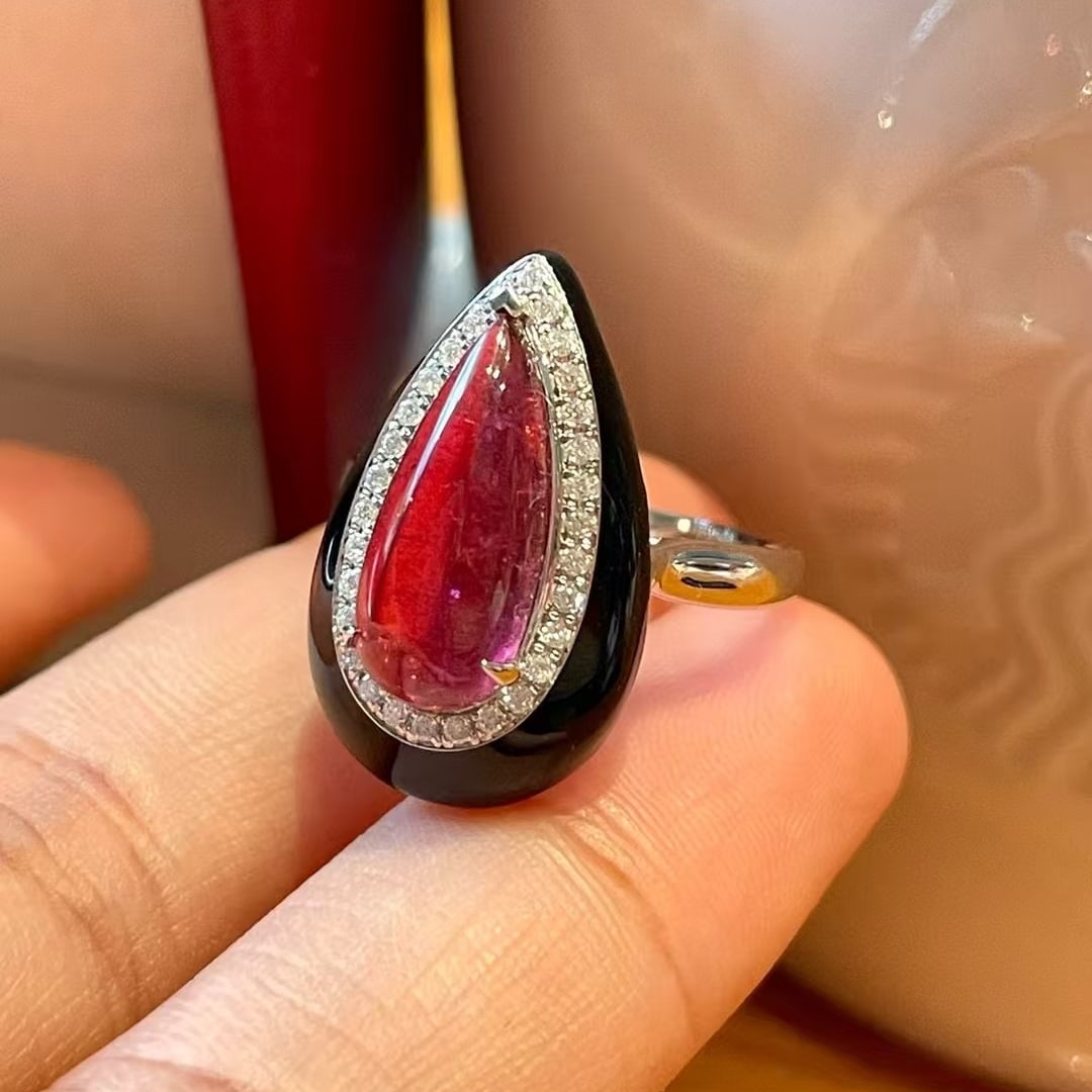 14k Gold 2.6 Ct Natural Tourmaline & Diamond Ring: Ref:231032364 // gold content:14k gold // ring size:7. 25us // // main gemstone:tourmaline // shape:pear // carat weight:2. 6ct // color:red // treatment:natural // // adjacent gemstone 2 : diamond