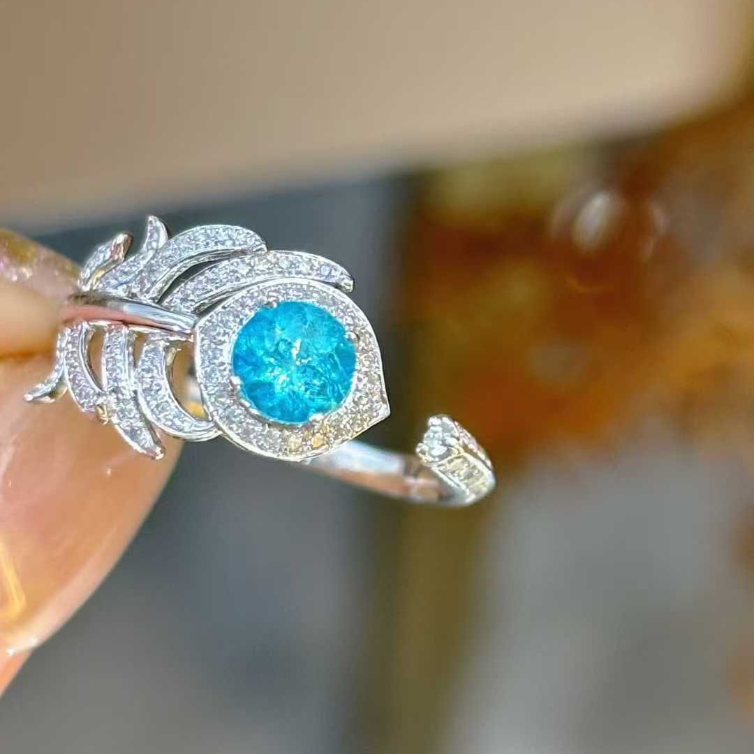 14k Gold 0.5 Ct Natural Paraiba Tourmaline & Diamond Ring: Ref:231032371 // gold content:14k gold // ring size:7. 25us // // main gemstone:paraiba tourmaline // shape:round // carat weight:0. 5ct // color:blue // treatment:natural // cut grade:g // //