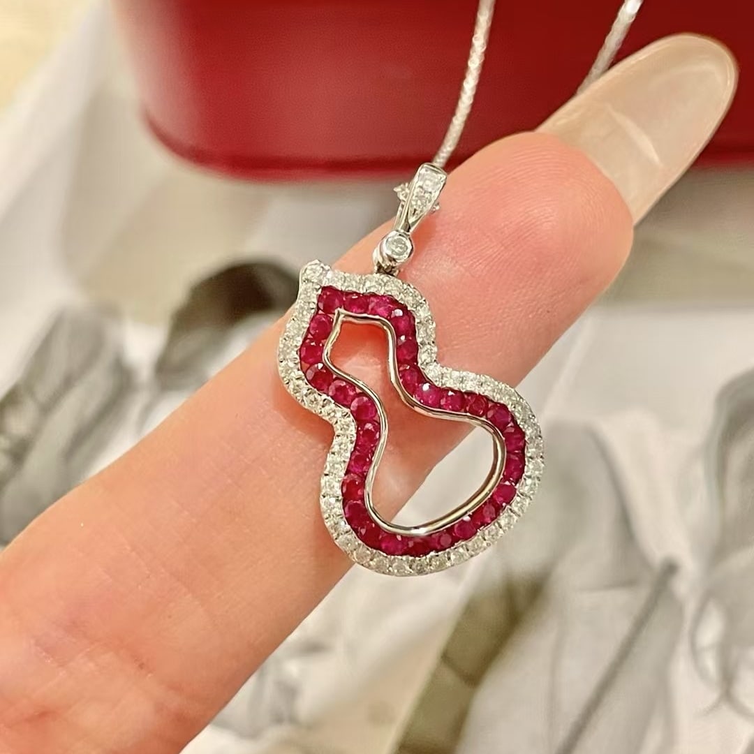 14k Gold 0.5 Ct Natural Ruby & Diamond Pendant( Without Chain ): Ref:231032399 // gold content:14k gold // main gemstone:ruby // shape:round // carat weight:0. 5ct // color:red // treatment:natural // cut grade:g // // adjacent gemstone 2 : diamond // shape:round