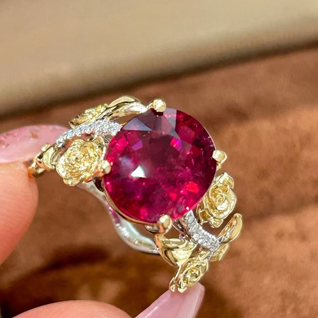 14k Gold 5.73 Ctw Natural Tourmaline & Diamond Ring: Ref:231032419 // gold content:14k gold // ring size:7. 25us // // main gemstone:tourmaline // shape:oval // carat weight:5. 53ct // color:red // treatment:natural // // adjacent gemstone 2 : diamond