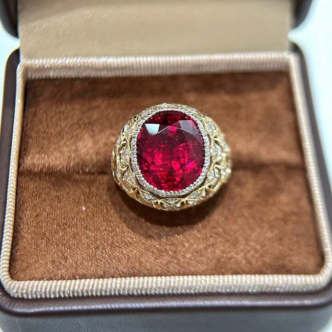 14k Gold 9.05 Ctw Natural Tourmaline & Diamond Ring: Ref:231032421 // gold content:14k gold // ring size:7. 25us // // main gemstone:tourmaline // shape:oval // carat weight:8. 5ct // color:red // treatment:natural // // adjacent gemstone 2 : diamond