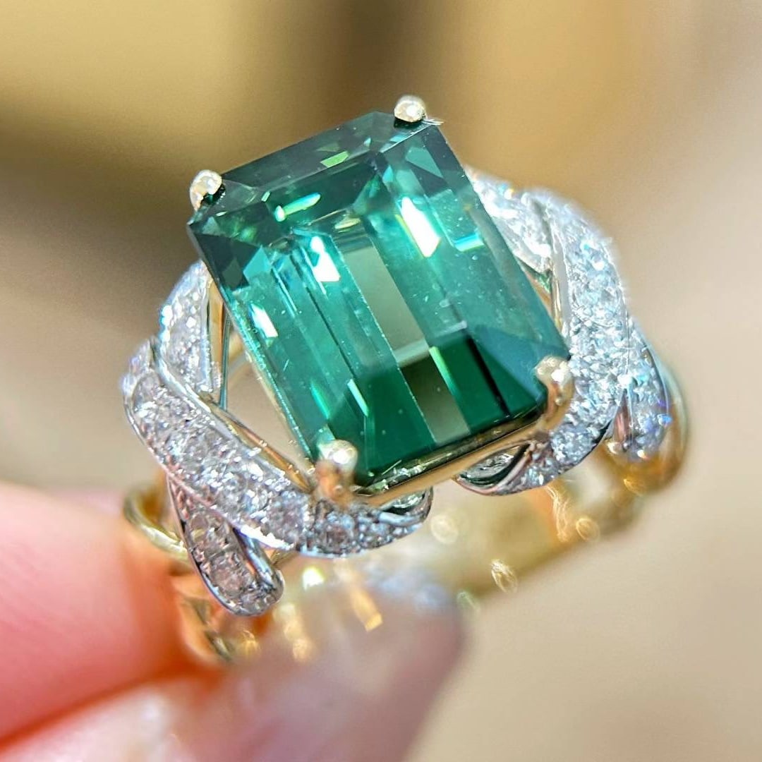 14k Gold 8.45 Ctw Natural Tourmaline & Diamond Ring: Ref:231032428 // gold content:14k gold // ring size:7. 25us // // main gemstone:tourmaline // shape:octagonal // carat weight:7. 7ct // color:green // treatment:natural // // adjacent gemstone 2 :