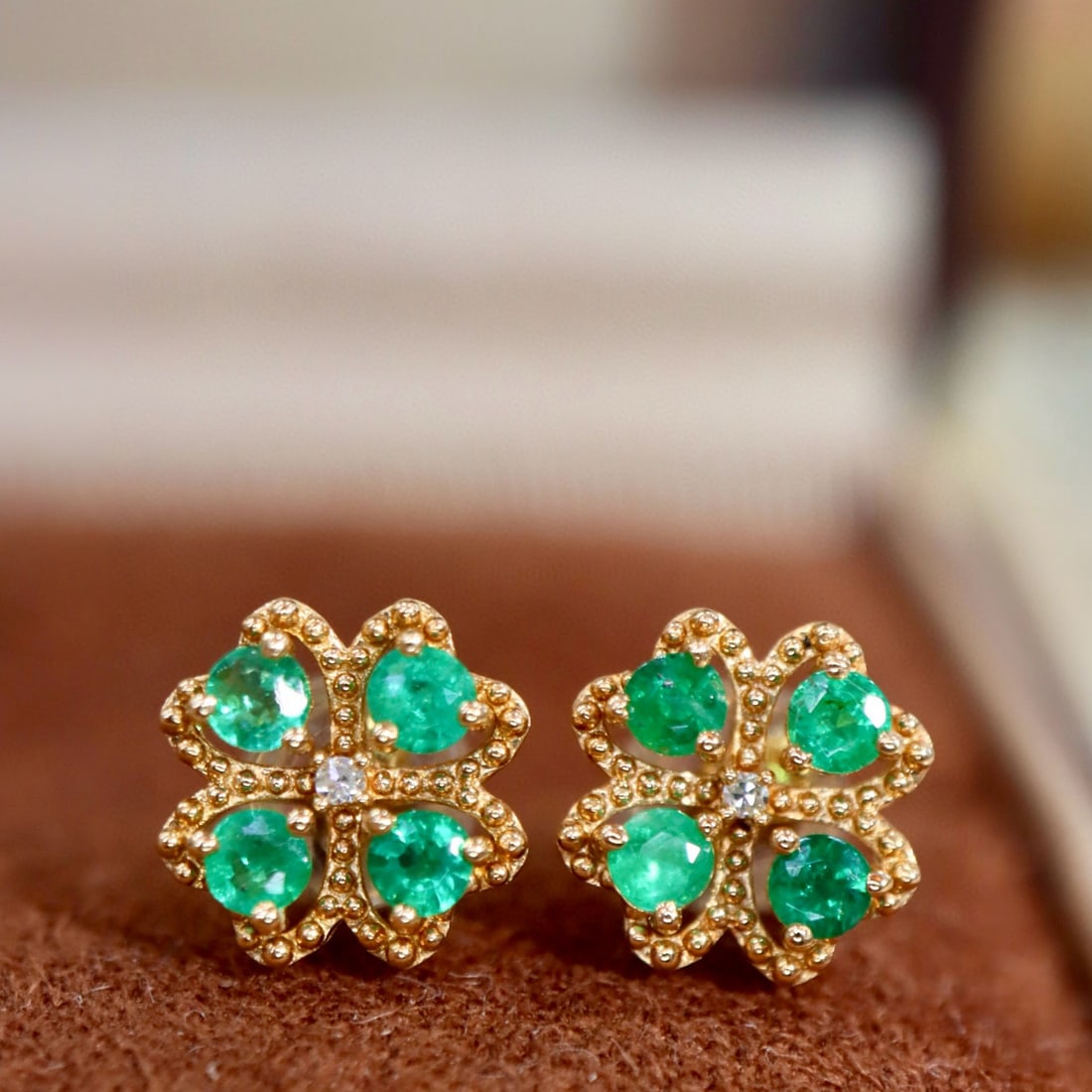 14k Gold 0.50 Ct Natural Emerald Earrings: Ref:231032437 // gold content:14k gold // main gemstone:emerald // shape:round // carat weight:0. 50ct // color:green // treatment:natural // cut grade:g // Low Estimate: 1300 High Estimate: 2000 Cond