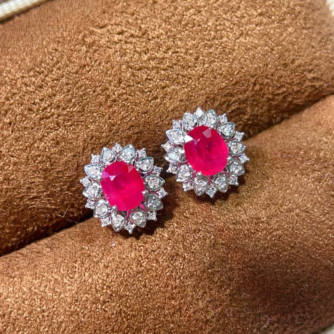 14k Gold 1.30 Ctw Natural Ruby & Diamond Earrings: Ref:231032448 // gold content:14k gold // main gemstone:ruby // shape:oval // carat weight:1. 2ct // color:red // treatment:natural // // adjacent gemstone 2 : diamond // shape:round // carat