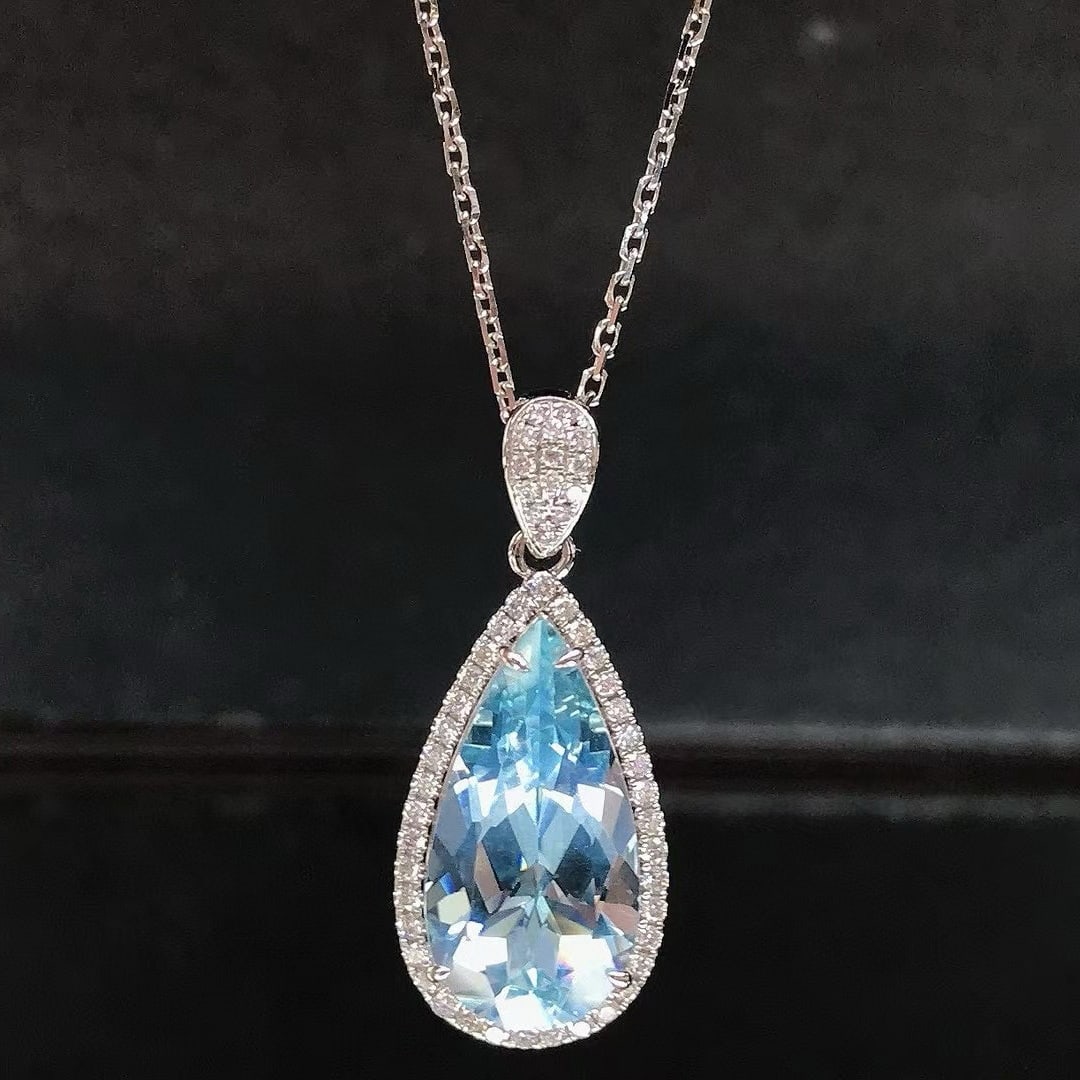 14k Gold 4.31 Ctw Natural Aquamarine & Diamond Pendant( Without Chain ): Ref:231033015 // gold content:14k gold // main gemstone:aquamarine // shape:pear // carat weight:4. 08ct // color:blue // treatment:natural // // adjacent gemstone 2 : diamond // shape:round // carat