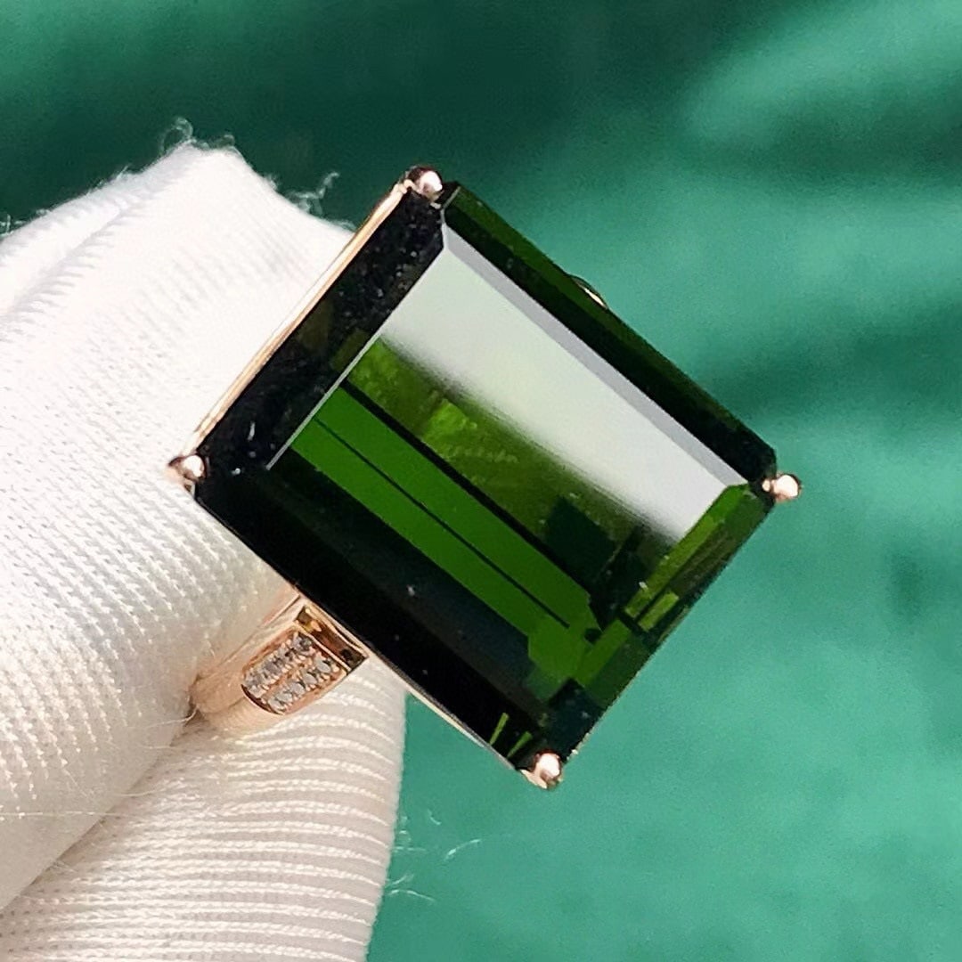 14k Gold 13.96 Ctw Natural Tourmaline & Diamond Ring: Ref:231033045 // gold content:14k gold // ring size:7. 25us // // main gemstone:tourmaline // shape:octagonal // carat weight:13. 9ct // color:green // treatment:natural // // adjacent gemstone 2 :