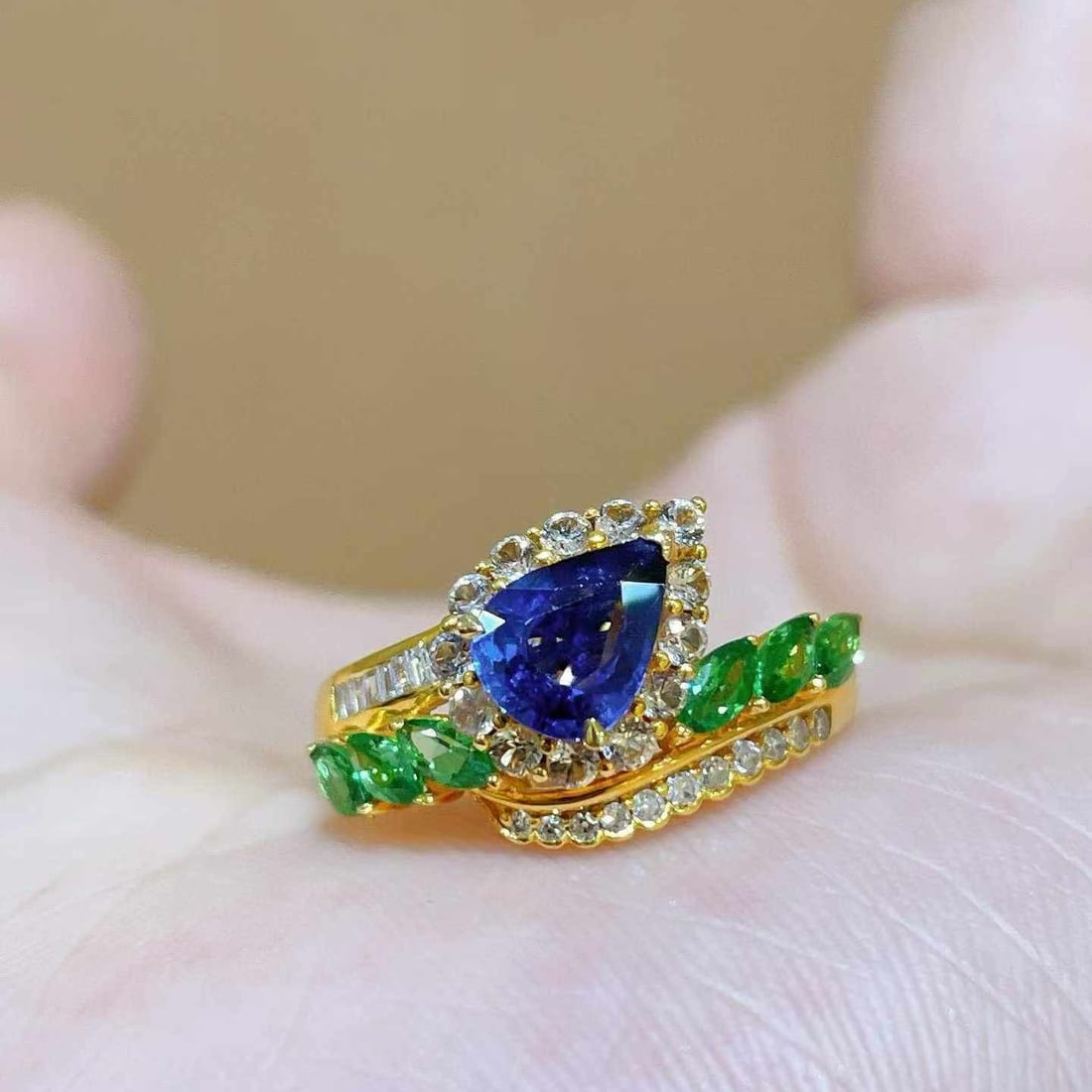 14k Gold 0.95 Ct Natural Sapphire & Tsavorite & Diamond & Sapphire Ring: Ref:231033076 // gold content:14k gold // ring size:7. 25us // // main gemstone:sapphire // shape:pear // carat weight:0. 95ct // color:blue // treatment:natural // // adjacent gemstone 2 : tsavorite
