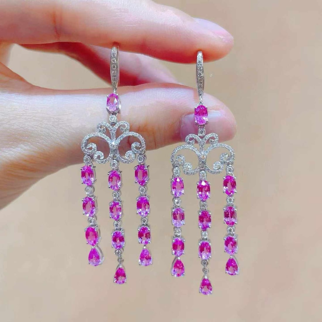 14k Gold 8.89 Ctw Natural Sapphire & Diamond Earrings: Ref:231033080 // gold content:14k gold // main gemstone:sapphire // shape:oval & pear // carat weight:8. 17ct // color:pink // treatment:natural // // adjacent gemstone 2 : diamond // shape:round // c