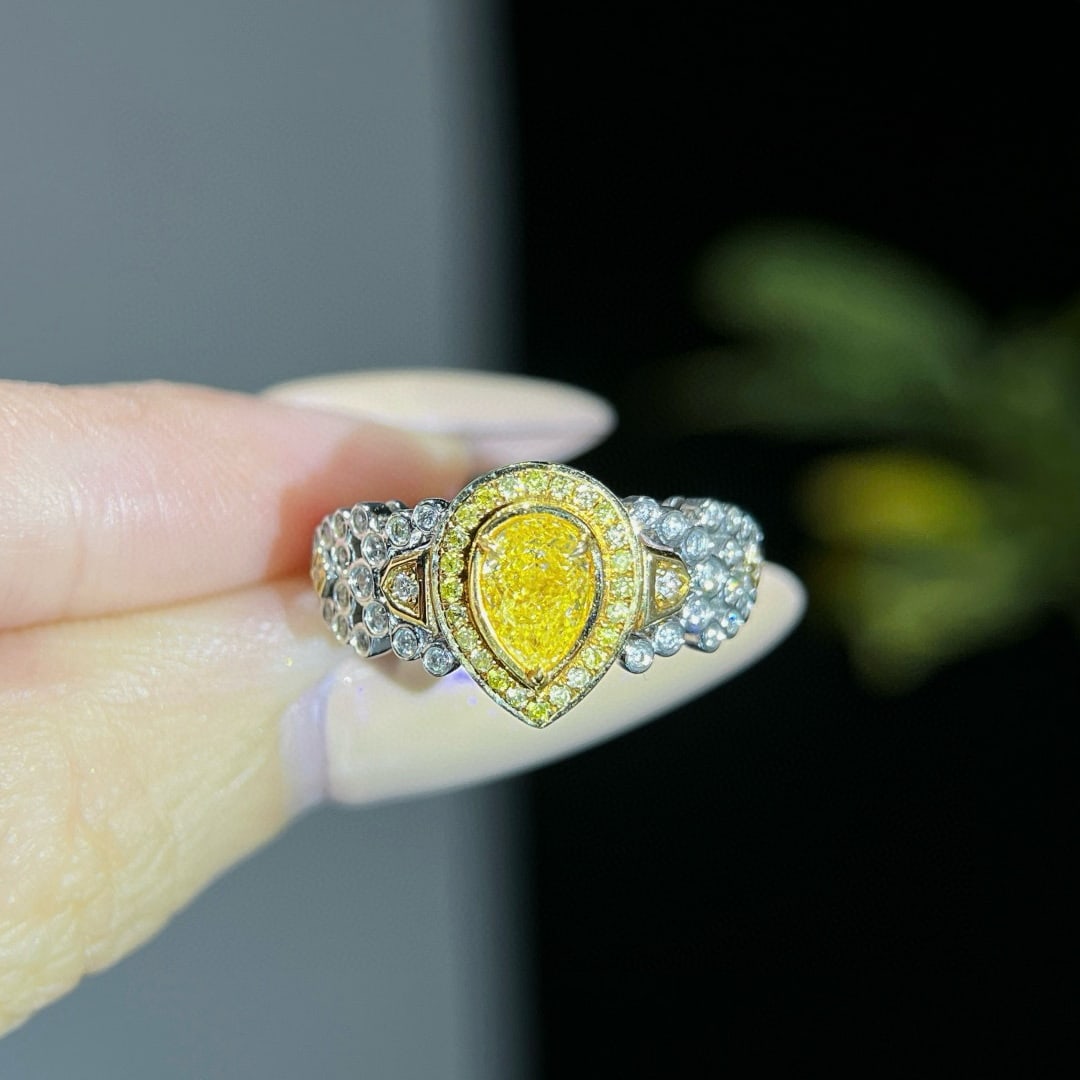 14k Gold 0.96 Ctw Natural Yellow Diamond & Diamond Ring: Ref:231033088 // gold content:14k gold // ring size:7. 25us // // main gemstone:yellow diamond // shape:pear // carat weight:0. 69ct // color:yellow // treatment:natural // // adjacent gemstone 2 :