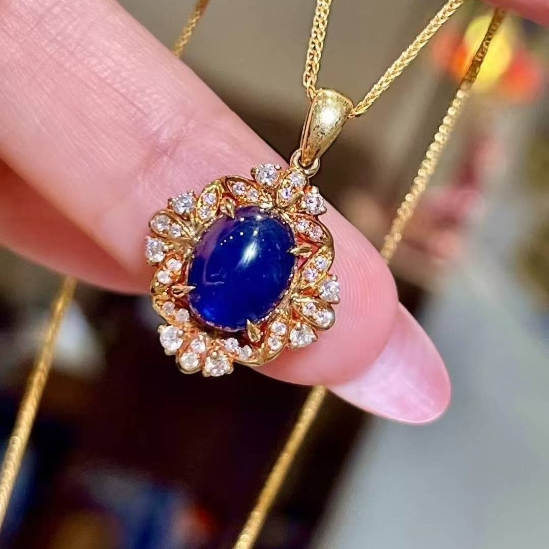 14k Gold 3.18 Ctw Natural Sapphire & Diamond Pendant( Without Chain ): Ref:231033101 // gold content:14k gold // main gemstone:sapphire // shape:oval // carat weight:2. 94ct // color:blue // treatment:natural // // adjacent gemstone 2 : diamond // shape:round // carat