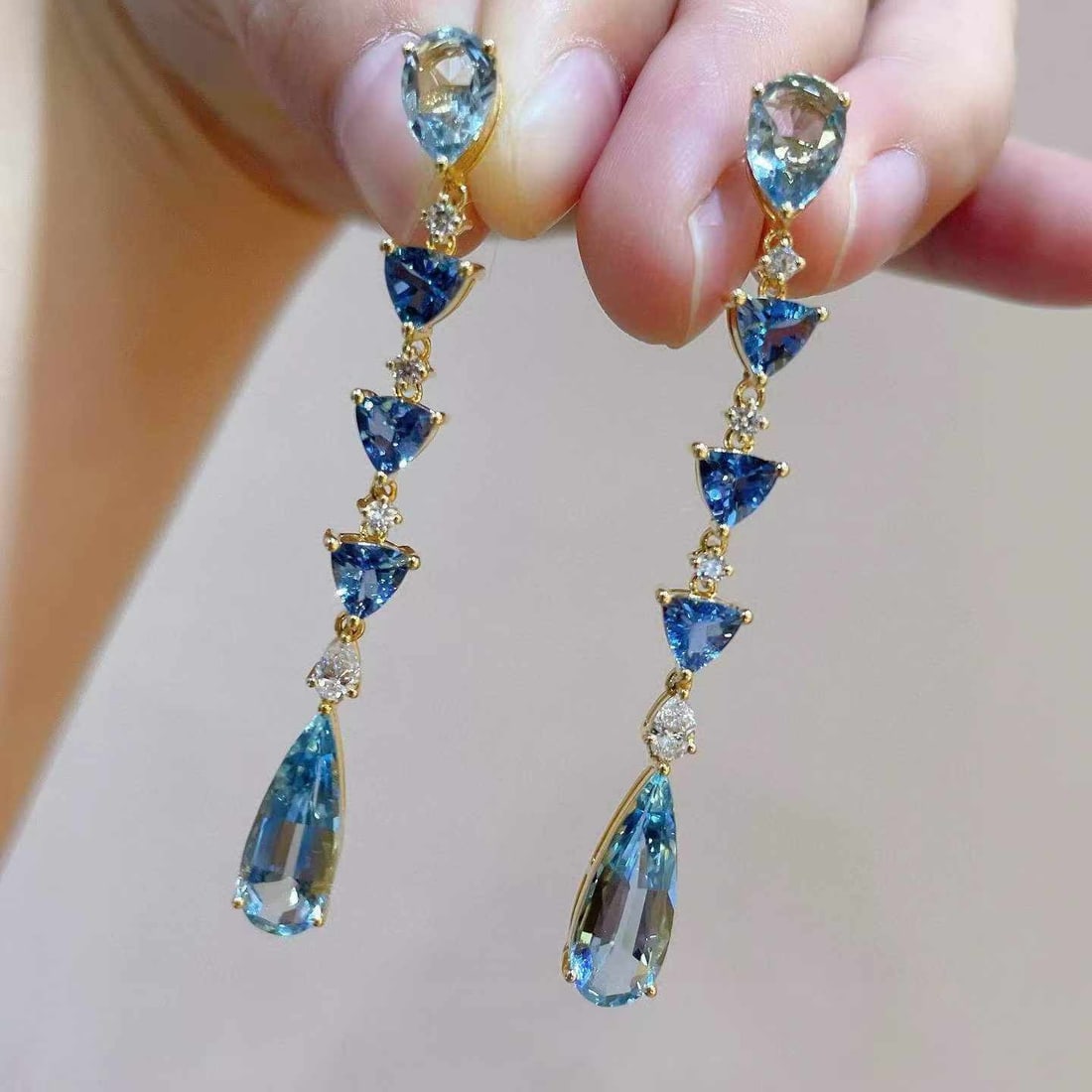 14k Gold 8.24 Ctw Natural Aquamarine & Diamond Earrings: Ref:231033106 // gold content:14k gold // main gemstone:aquamarine // shape:pear // carat weight:7. 79ct // color:blue // treatment:natural // // adjacent gemstone 2 : diamond // shape:multiply // car
