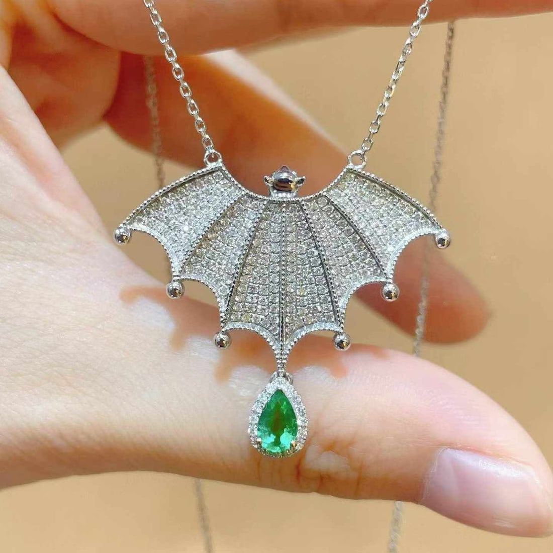 14k Gold 1.26 Ctw Natural Emerald & Diamond Necklace: Ref:231033114 // gold content:14k gold // main gemstone:emerald // shape:pear // carat weight:0. 37ct // color:green // treatment:natural // // adjacent gemstone 2 : diamond // shape:round // carat
