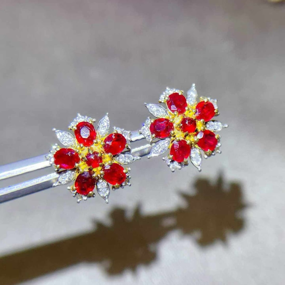 14k Gold 1.88 Ctw Natural Ruby & Diamond Earrings: Ref:231033116 // gold content:14k gold // main gemstone:ruby // shape:round & oval // carat weight:1. 54ct // color:red // treatment:natural // // adjacent gemstone 2 : diamond // shape:round //