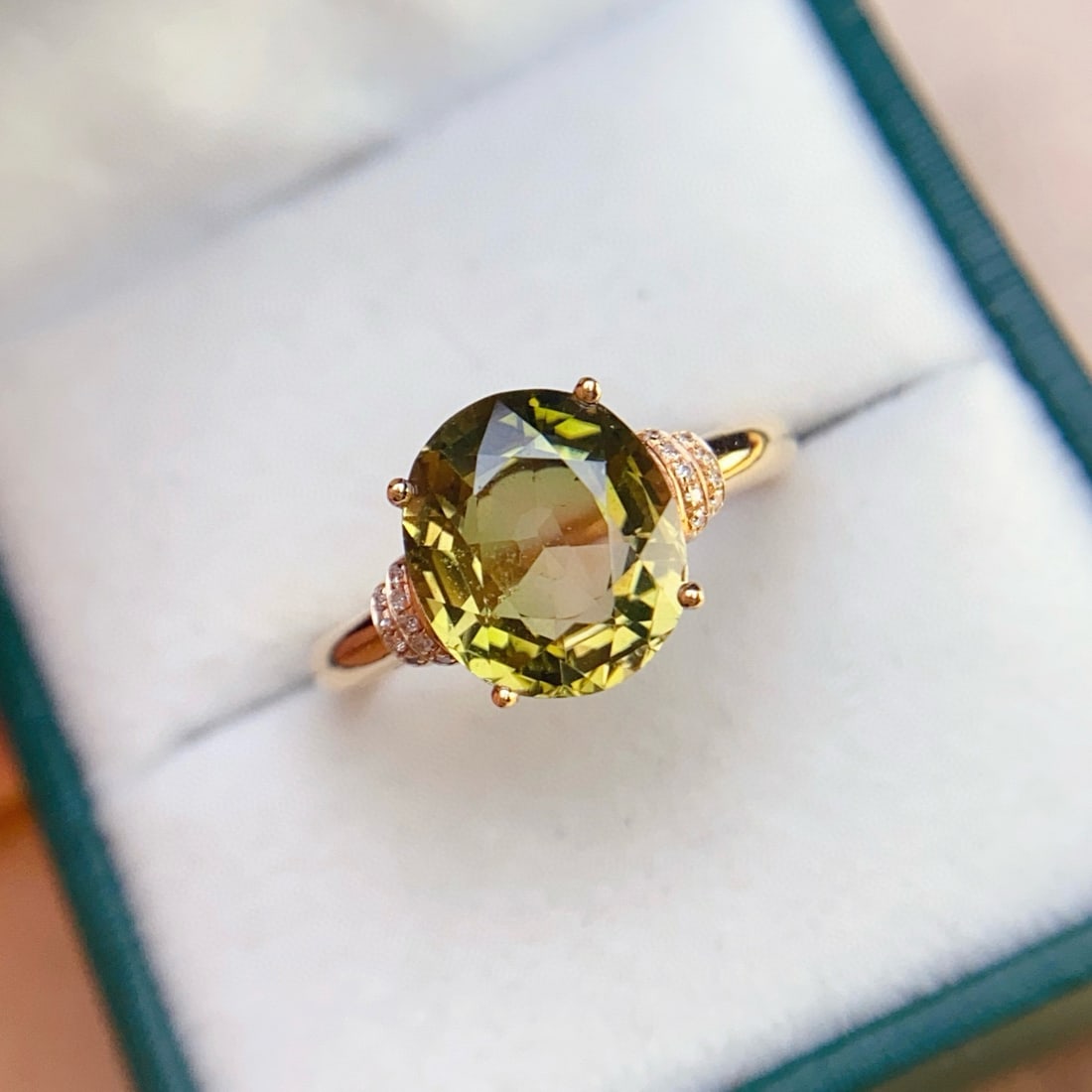 14k Gold 3.4 Ct Natural Tourmaline & Diamond Ring: Ref:231033124 // gold content:14k gold // ring size:7. 25us // // main gemstone:tourmaline // shape:oval // carat weight:3. 4ct // color:green // treatment:natural // // adjacent gemstone 2 : diamond
