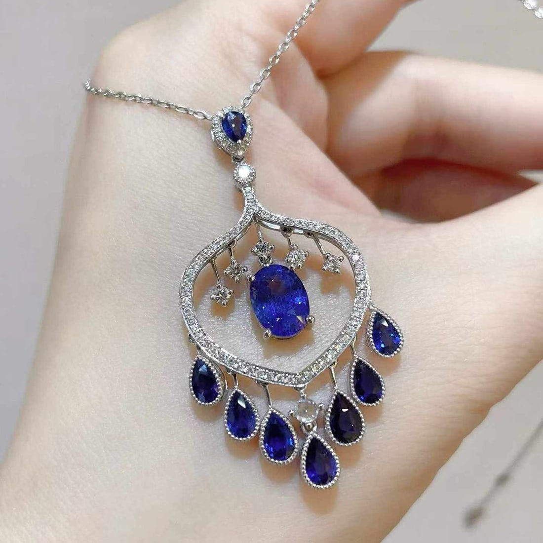 14k Gold 4.34 Ctw Natural Sapphire & Sapphire Pendant( Without Chain ): Ref:231033135 // gold content:14k gold // main gemstone:sapphire // shape:oval // carat weight:2. 05ct // color:blue // treatment:natural // // adjacent gemstone 2 : sapphire // shape:pear // carat