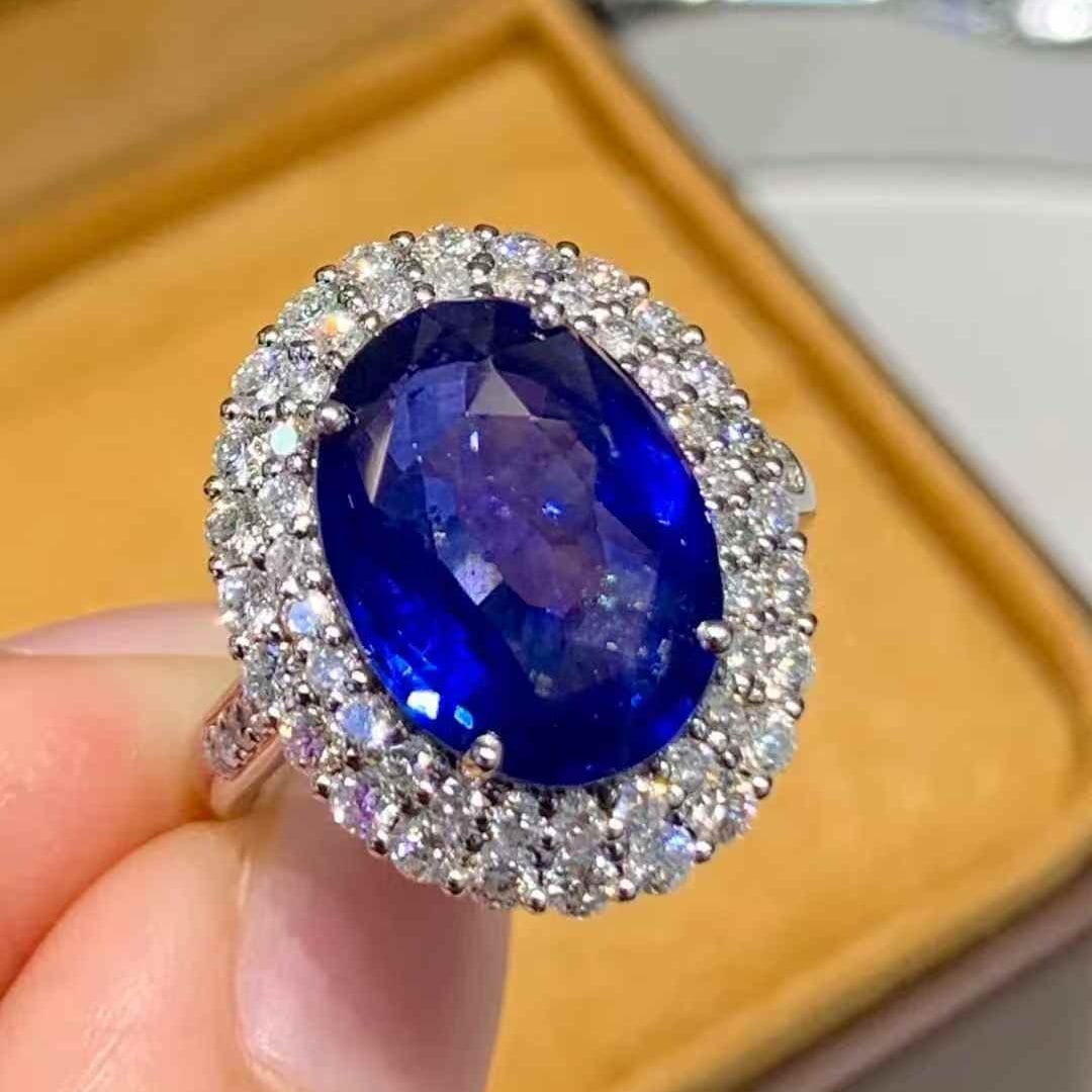 14k Gold 5.85 Ct Natural Sapphire & Diamond Ring: Ref:231033139 // gold content:14k gold // ring size:7. 25us // // main gemstone:sapphire // shape:oval // carat weight:5. 85ct // color:blue // treatment:natural // // adjacent gemstone 2 : diamond //