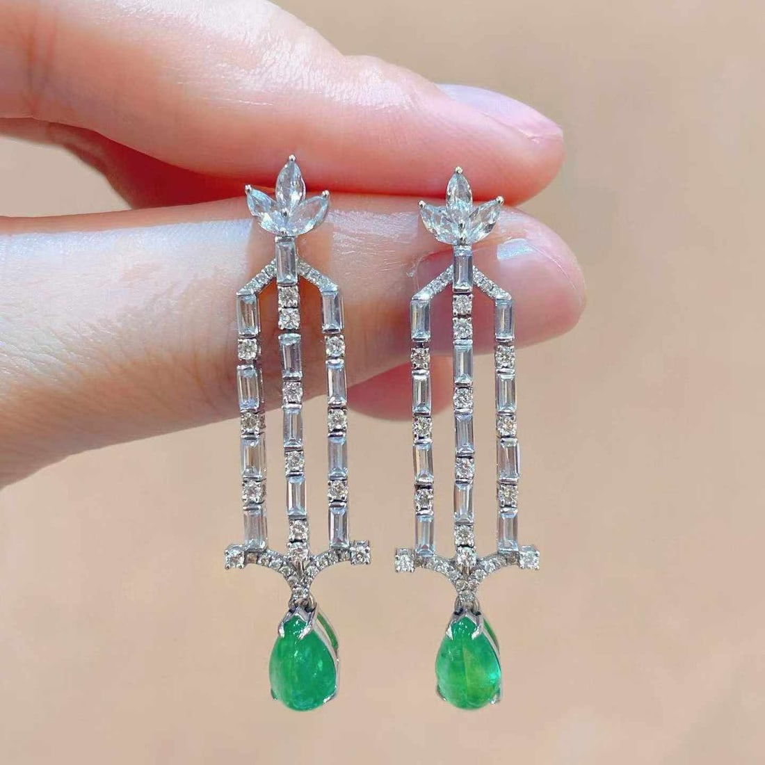 14k Gold 2.51 Ctw Natural Emerald & Diamond Earrings: Ref:231033141 // gold content:14k gold // main gemstone:emerald // shape:pear // carat weight:1. 99ct // color:green // treatment:natural // // adjacent gemstone 2 : diamond // shape:round // carat we