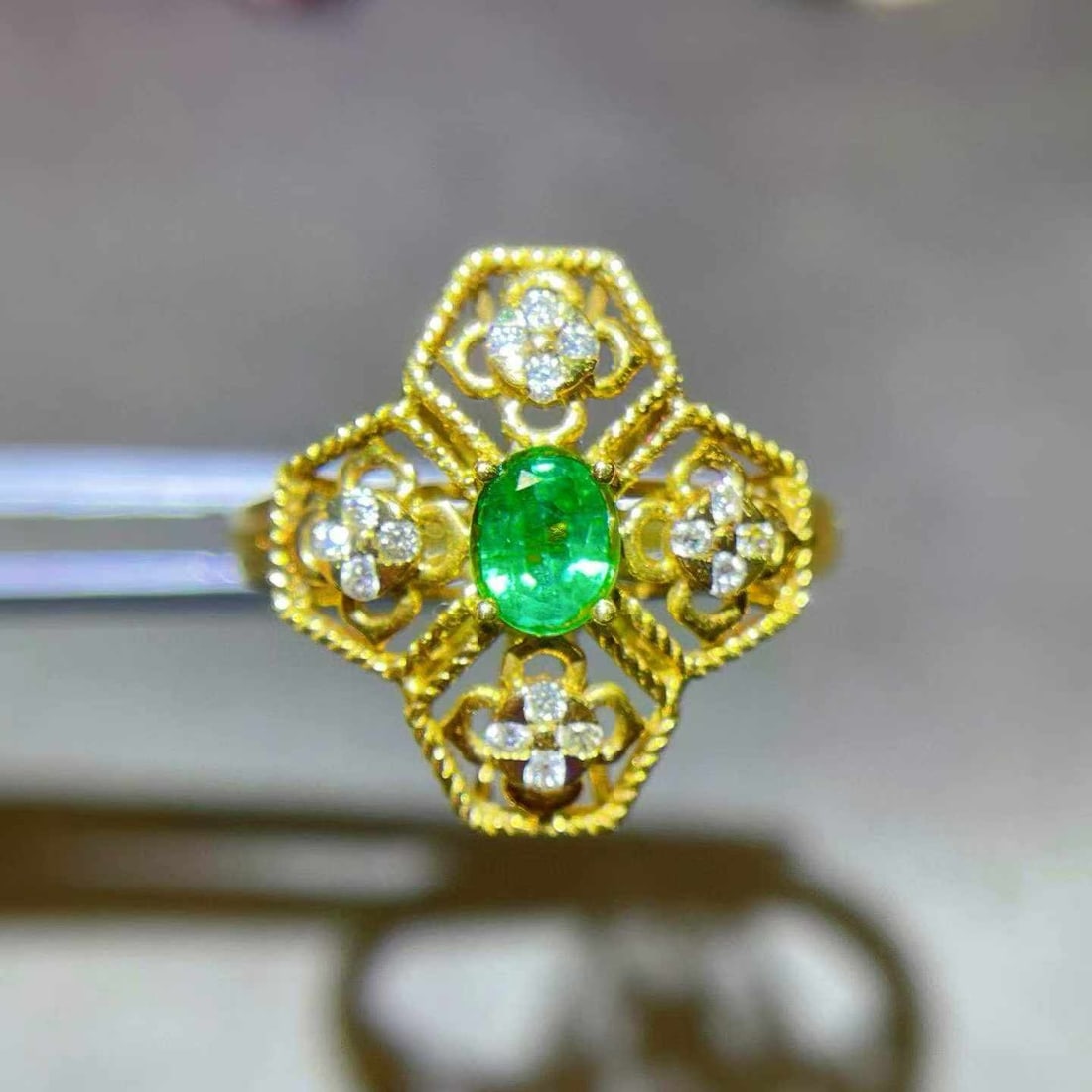 14k Gold 0.42 Ctw Natural Emerald & Diamond Ring: Ref:231033169 // gold content:14k gold // ring size:7. 25us // // main gemstone:emerald // shape:oval // carat weight:0. 32ct // color:green // treatment:natural // // adjacent gemstone 2 : diamond